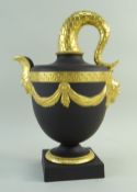 WEDGWOOD BLACK BASALT 'FISHTAIL' EWER, limited edition no. 12/100, with scaled handle, mask spout,