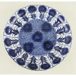 CHINESE BLUE & WHITE 'ASTER' PATTERN SAUCER DISH, Kangxi, painted with typical design of flowerheads