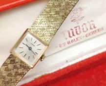 TUDOR FOR ROLEX 9CT GOLD LADIES WRISTWATCH, the square champagne dial having baton markers, engraved