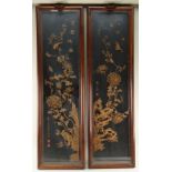 PAIR CHINESE DONGYANG WOOD CARVINGS, 20th Century, depicting vertical sprays of chrysanthemums