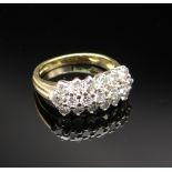 18CT GOLD TRIPLE ROW DIAMOND RING having 19 diamonds in total measuring 0.05cts each approx. (visual