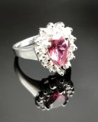 9CT WHITE GOLD TOURMALINE & DIAMOND DRESS RING, the central pear shaped pink tourmaline sur
