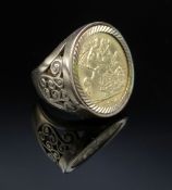 9CT GOLD PIERCED HALF SOVEREIGN RING, ring size K, 10.8gms
