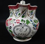 RARE WILLIAM IV DATED POTTERY JUG, dated 1835 and with initials 'WEJ', painted with wild flowers and