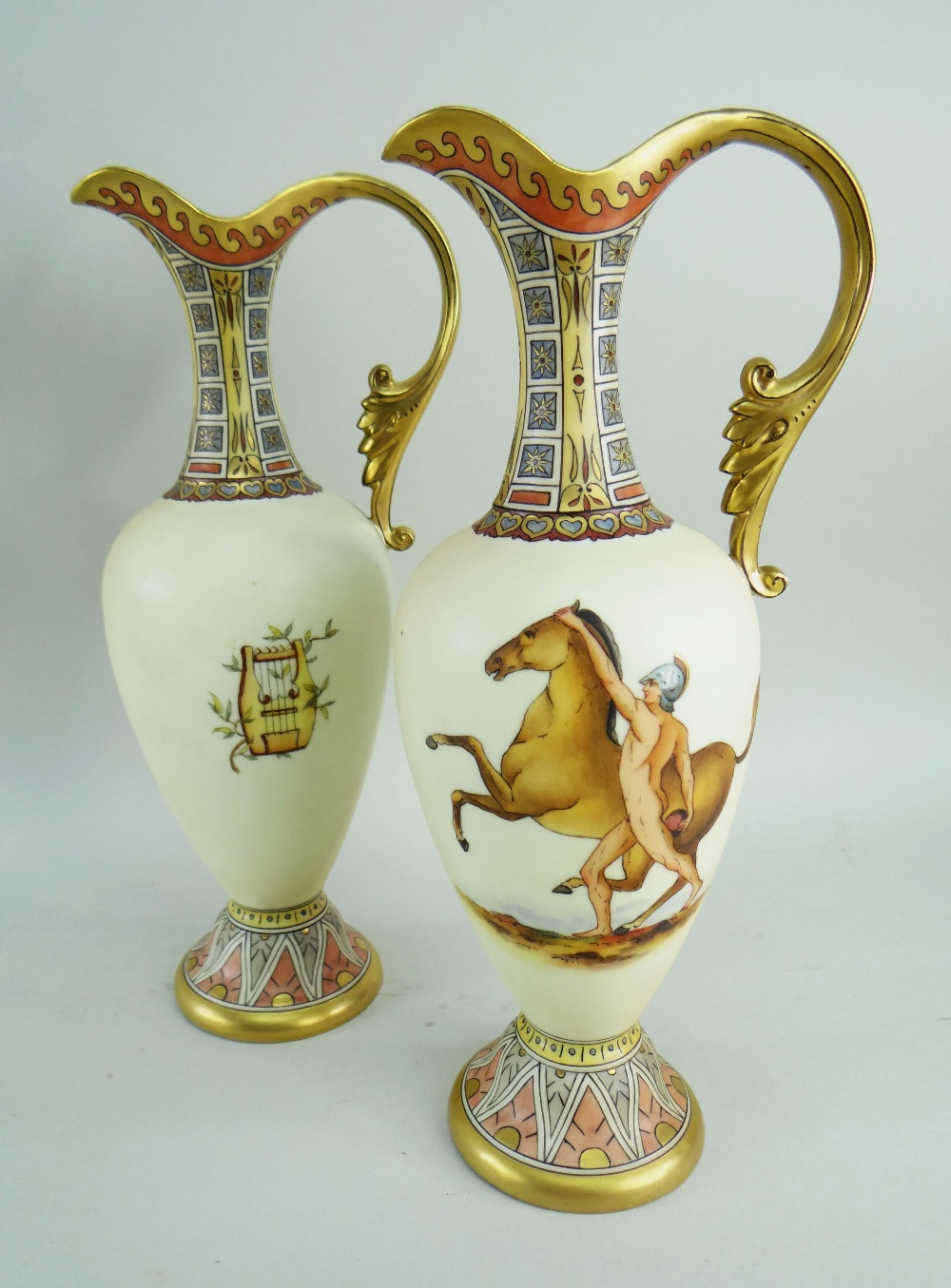 PAIR RUDOLSTADT (LAZARUS STRAUSS & SONS) PORCELAIN EWERS, CIRCA 1910, of neo-classical style,