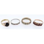 FOUR ASSORTED RINGS comprising 9ct white gold ruby and diamond ring, 9ct gold five stone garnet