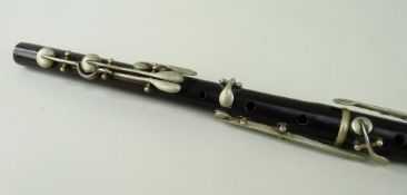 ANTIQUE ROSEWOOD 8-KEY FLUTE, nickel keys and collars, 67cms long Comment: mouthpiece cracked, lower