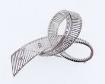 18CT WHITE GOLD BOW DESIGN DIAMOND BAR BROOCH, 5.4cms wide, 9.3gms in associated box