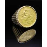 1931 GOLD SOVEREIGN RING, in reeded, presumed 9ct gold, mount, 20.2g Comments: hallmarks unclear.