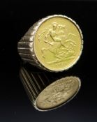 1931 GOLD SOVEREIGN RING, in reeded, presumed 9ct gold, mount, 20.2g Comments: hallmarks unclear.