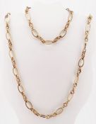9CT YELLOW GOLD MATCHING NECKLACE (59CMS LONG) & BRACELET (18CMS LONG), oval fancy link, 49.1gms