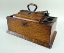 19TH CENTURY OAK CIGAR BOX, hinged lid with metal handle and integral cigar cutter, between