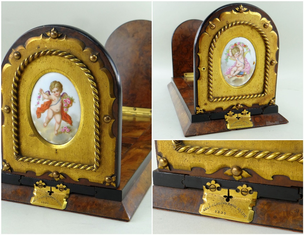 VICTORIAN WALNUT, GILT METAL & PORCELAIN PATENT BOOK SLIDE, with Betjeman's patent self-closing