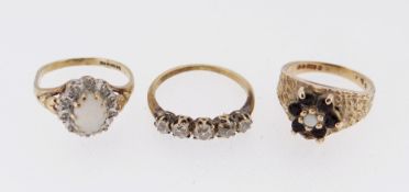 THREE GOLD RINGS comprising five stone diamond ring, opal and diamond chip 9ct gold ring and an opal