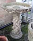 COMPOSITION GARDEN BIRD TABLE, with vineleaf moulded column and table frieze, 78h x 60cms d