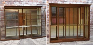 TWO OAK SHOP DISPLAY CASES, with painted interiors with adjustable shelves and mirror backs, one