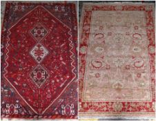TWO RUGS, including Qashqai with triple joined lozenges to the hexagonal red floral field, blue-grey