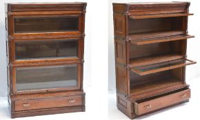 FINE PAIR OF GLOBE WERNICKE-TYPE MAHOGANY BOOKCASES with acanthus carved and dental cornices, each