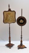 TWO EARLY VICTORIAN POLE SCREENS, one with rosewood baluster column on circular platform base and