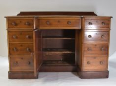 VICTORIAN WALNUT INVERTED BREAK-FRONT PEDESTAL DESK, top inset with later tooled leather writing