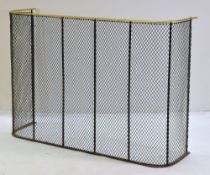 ANTIQUE BRASS FENDER, D-form with woven metal wire grille, 115 x 30 x 76cms