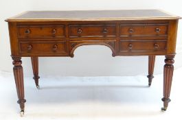GOOD EARLY VICTORIAN WALNUT WRITING TABLE IN THE MANNER OF GILLOWS, inset writing surface above
