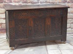 19TH CENTURY OAK COFFER, with Renaissance style carved paneled front, on later casters,75h x 119w