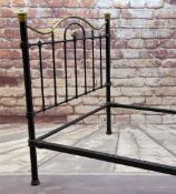 EDWARDIAN CAST IRON & BRASS DOUBLE BED FRAME, shaped bar head and footboard, with ornamented clasps,