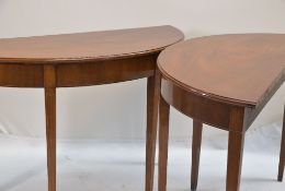 PAIR 19TH CENTURY MAHOGANY DEMI-LUNE TABLES, moulded tops above boxwood and ebony line inlaid frieze