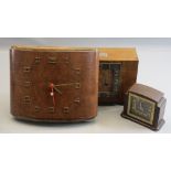 ART DECO CLOCKS - an excellent crossbanded mantel clock on bracket feet, bearing plaque 'Presented