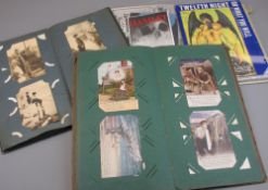 POSTCARDS (approximately 200) - two vintage albums and a collection of old theatre programmes in