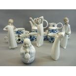 LLADRO FIGURINES - three children in various poses, 21cms tall the boy, a boxed Lladro Buddha