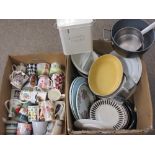 POTTERY TABLE & KITCHENWARE, colourful decorative mugs and a tin laundry powder box (within 2