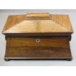 SARCOPHAGUS TEA CADDY - antique walnut with mother of pearl escutcheon on bun feet, 35cms H, 23cms