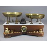 VINTAGE SHOPKEEPER'S SCALES with brass trays and weights and a marble top surface