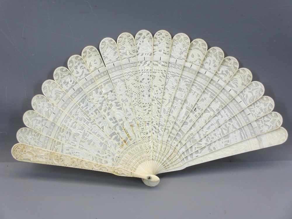 19TH CENTURY CARVED IVORY CHINESE CANTON BRISE FAN, the guard sticks decorated with people within