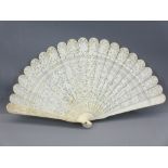 19TH CENTURY CARVED IVORY CHINESE CANTON BRISE FAN, the guard sticks decorated with people within