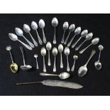 SILVER TEASPOONS, enamelled collector's spoons, sugar sifter, ETC, a mixed quantity with various