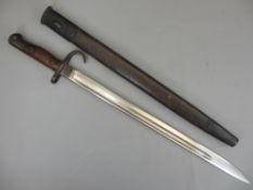 RARE WW1 1907 PATTERN AUSTRALIAN HOOKED QUILLON BAYONET with metal mounted leather scabbard, the