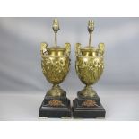 GILDED BRONZE URN TABLE LAMPS, A PAIR, on polished slate bases