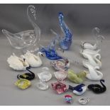 SWAN ORNAMENTS IN POTTERY & GLASSWARE, some being iridescent colourful glass