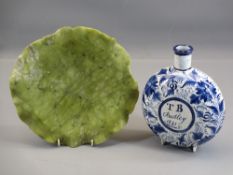 CARVED ONYX TYPE STONEWARE DISH and a delftware circular flask inscribed to the front 'T B Audley