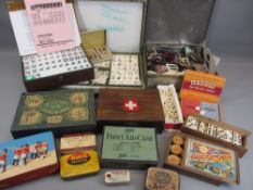 CARD GAMES, VINTAGE DOMINOES, draughts pieces and advertising tins, an assortment. Also, tin