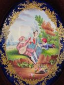 HAND PAINTED PORCELAIN PLAQUE depicting children with musical instruments, cobalt blue and gilt