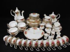 ROYAL ALBERT OLD COUNTRY ROSES TEA & DINNERWARE - approximately 85 pieces. Also, four items of