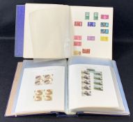BRITISH STAMPS COLLECTION - two part filled albums, almost entirely Elizabeth, mainly Mint with some