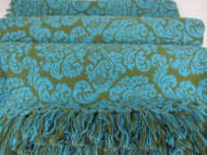 A DAFRA TRADITIONAL BLANKET - in green and blue, 275 x 185cms, with label and tasselled ends