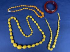 AMBER BEAD NECKLACE and similarly styled jewellery, four items (untested), to include a uniform