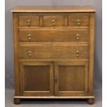 VINTAGE OAK TALLBOY - having three small drawers over two long drawers and twin lower cupboard