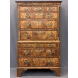 GEORGE III PERIOD WALNUT CHEST ON CHEST having a shaped cornice over an arrangement of three